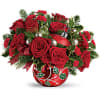 Hand-glazed with a shimmering finish and jolly holly details, this keepsake ornament