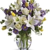 Dance into spring! Send this feminine bouquet of favorite spring flowers to