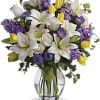 Dance into spring! Send this feminine bouquet of favorite spring flowers to
