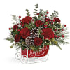 Sleigh all day! Bursting with fresh flowers and vintage nostalgia, this antiqued
