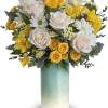 Sunny yellow roses and cloud-white blooms look fresh as can be in