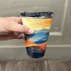 This colorful bouquet is designed in one of our insulated metal travel