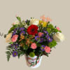 The Happy Mother&#039;s Day Bucket features a stunning assortment of vibrant flowers