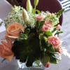 peach roses and white lilies