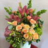 Peach roses,peach spray rose  pink lilies, bells of Ireland, green and