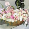 Rectangular vase with blush white and nude color flowers