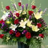 A touching papier m&acirc;ch&eacute; basket arrangement thoughtfully designed to honor and celebrate