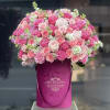 Gorgeous burgundy velvet box arrangement with garden roses, different pink toned roses