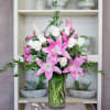 Roses and lilies. Other colors may be available.