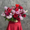 Celebrate love in full bloom with this exquisite Valentine&rsquo;s Day arrangement. Featuring