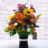 Our Caf&eacute; Jewel bouquet focuses on a jewel-toned color palette of sunflowers