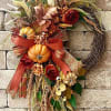Enhance your front door with this exquisite Fall Wreath, a perfect touch