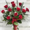 This Classic red  roses  arranged in a vase  is