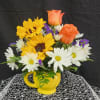 Sunflowers, roses and daisies with little pops of purple statice in