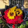 Beautiful bouquet with 50 red roses and 3 sunflowers. 