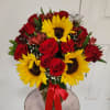 Crystal vase arrangement with 3 bright yellow sunflowers and 24 vivid red
