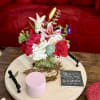Send a little romance with this petite arrangement in a short vase