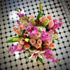 So pretty, this lush little arrangement, presented in a clear glass vase