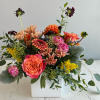 A darling mix of Dahlias and Roses make this a delightful gift!