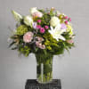 This bouquet is a lovely mixture of sweet heart roses, large roses