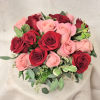 Embrace modern elegance with our exquisite floral arrangement featuring a striking combination