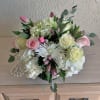 Introducing our Happy Thoughts floral arrangement, a vibrant display of pinks and