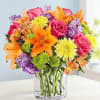 Like a warm embrace, our vibrant flower bouquet delivers your sentiments to