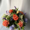 This lovely mixed of long lasting flowers arranged in a green compote