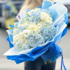 Celebrate the joy of a newborn baby boy with this exquisite bouquet