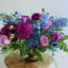 Immerse yourself in the captivating beauty of our April May Flowers original