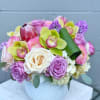 A vibrant arrangement to make MOM smile. 

- Delicately arranged by our