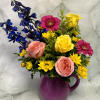 Give this pitcher to the perfect person in your life. This arrangement