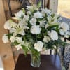 This versatile white arrangement can be used for Weddings, Sympathy, Easter, etc.
You