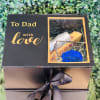 Gift box includes bottle of sparkling wine (187ml), preserved blue rose in