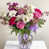The Virginia is a mix of seasonal flowers in white and lavender.