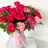 This is a large vase of flowers and is filled with 1