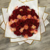 A bundle of beautiful blooms 25 Red Roses with 25 peach color