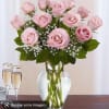 beautiful pink roses with babys breath including the vase