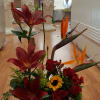 red Asiatic lilis and paradise flowers