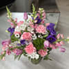 A vibrant spring bouquet adorned with delicate tulips, stock flowers, graceful lisianthus
