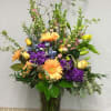 This Grand Vase arrangement makes a bold statement with a base design