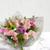 A bouquet of 12 pink roses and other seasonal flowers for any