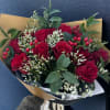 12 red roses with greens and filler for any occasions.
Deluxe is 18