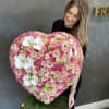  Standing Heart Floral Arrangement
This heart-shaped arrangement is a graceful expression of