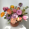 Let this arrangement take you to a bohemian dreamland! Filled with beautiful