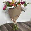 A beautiful hand wrapped bouquet, with the freshest flowers of the day.