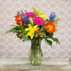 Bright and Beautiful Mixed Spring Arrangement. Variety of flowers gives designers range