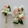 Set of Corsage and Boutonniere include white dendrobium orchids and pink spray