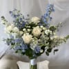 Theme Colors: Shades of white with hints of blue

Featured Blooms: Roses, Delphiniums