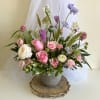 Theme Colors: Shades of pinks, purples and blues

Featured Blooms: Rose, Ranunculus, Spray
